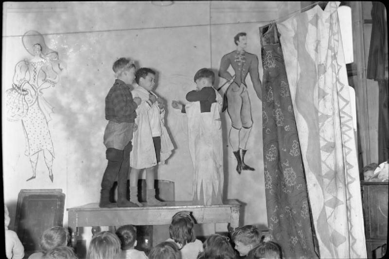 Children playing hopscotch in 1944