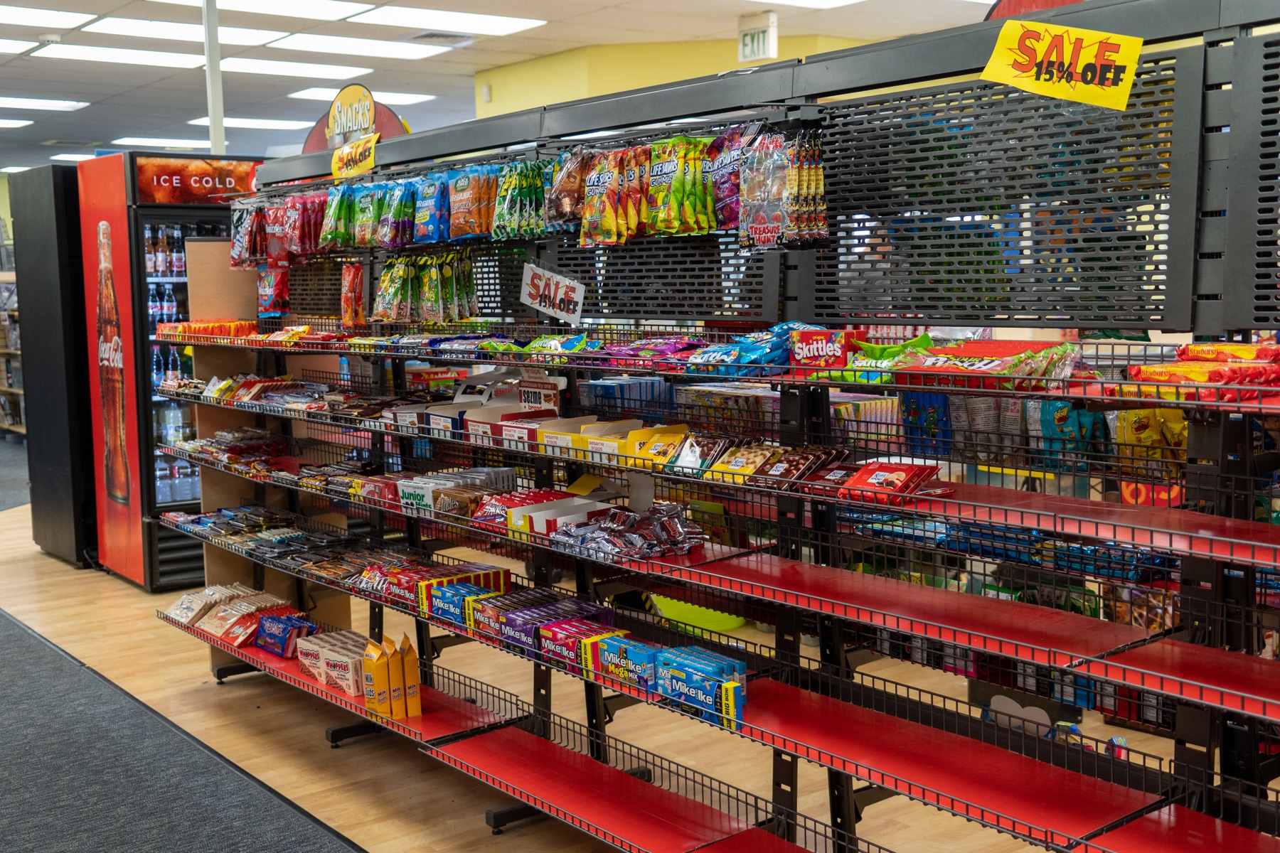 Candy, snacks and bottled soda displayed inside a Blockbuster Video store