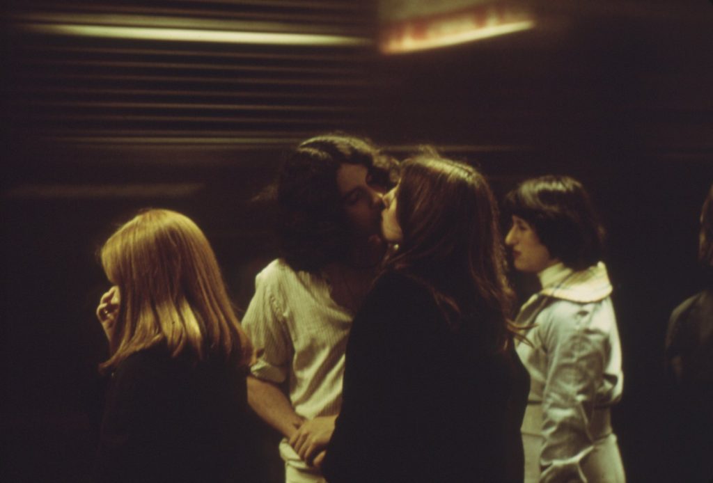 A young couple kissing goodbye on the train platform at Philadelphia’s 30th Street Station in April 1974 before the Metroliner departs