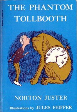 Blue book jacket with the title The Phantom Tollbooth in white above a drawing of a boy in a cap standing nose to nose with a large brown dog whose body is an alarm clock; Norton Juster, Illustrations by Jules Feiffer.