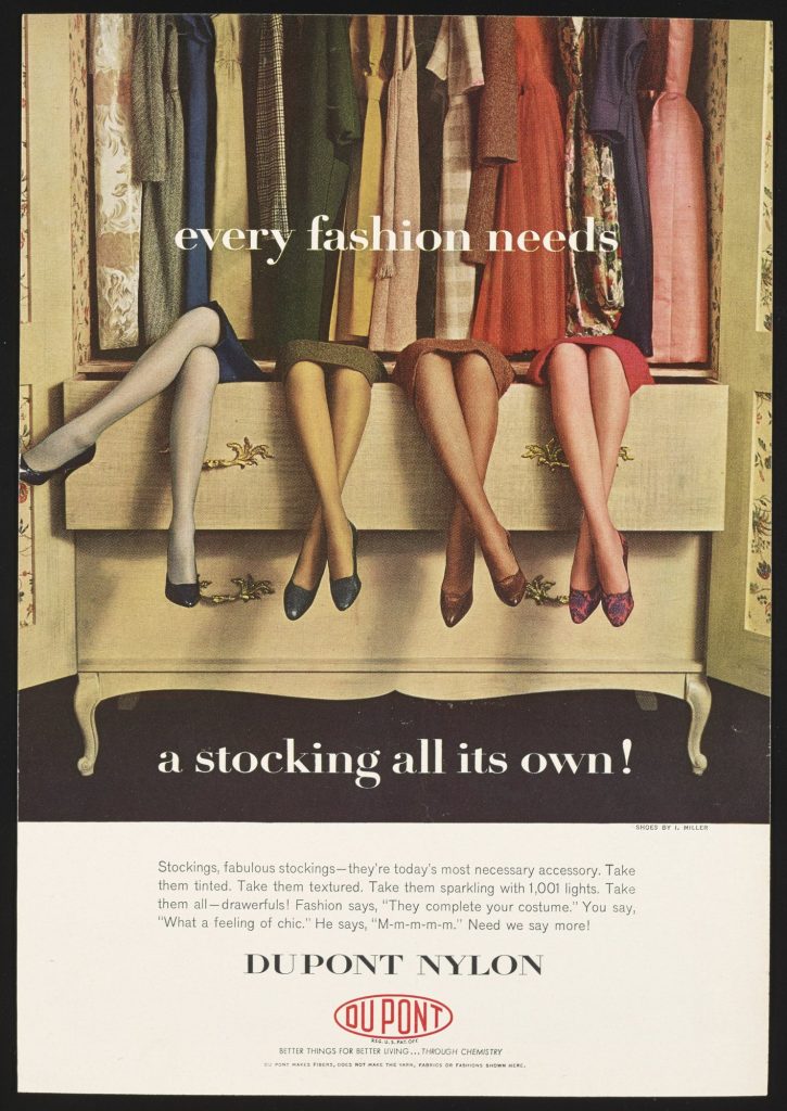 Magazine ad showing the crossed legs of four women in tinted nylon stockings sitting on an open dresser drawer under a closet of dresses, with the words every fashion needs a stocking all its own and DuPont Nylon
